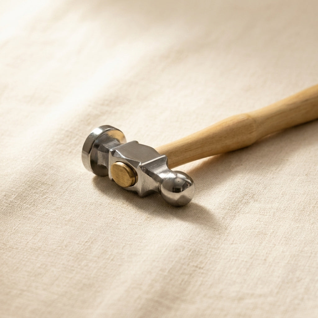 Silversmiths chasing hammer with 25mm flat face and wooden handle, for repousse work.