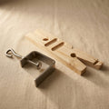 Jewellery bench saw pin vice with V-slot clamp and ring cutting jig, 7-inch overall length.