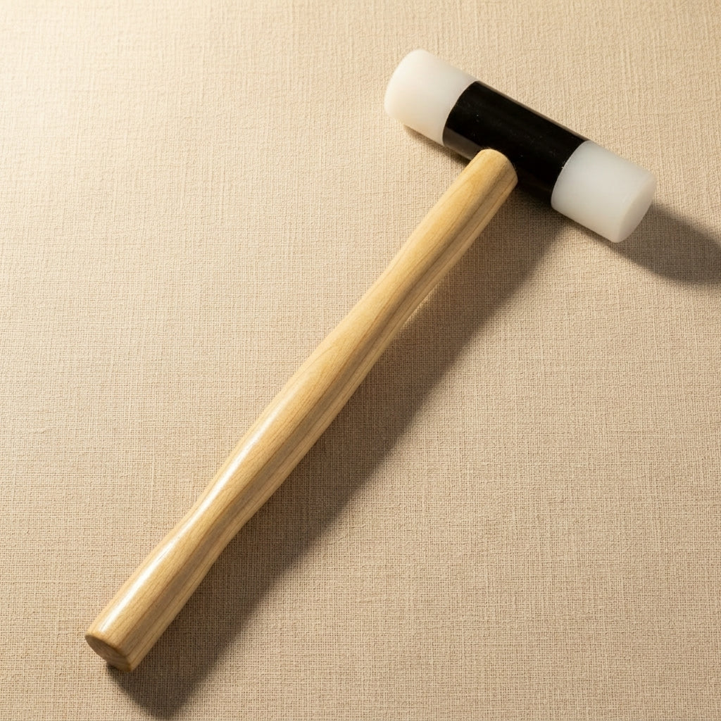 Wooden handled mallet with 1.25 inch nylon head for jewellery shaping and forming.