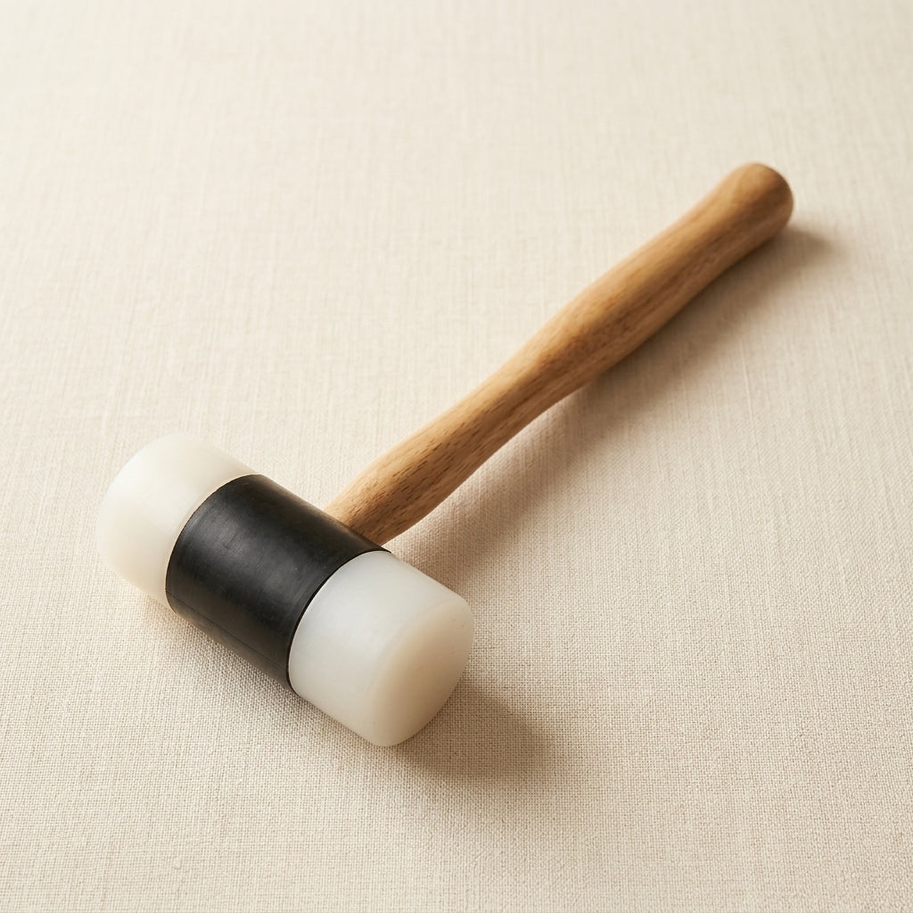 Wooden handled mallet with a 1.50" nylon head for jewellery shaping