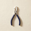 Nylon-jawed parallel-action pliers for bending metal jewellery and craftwork.