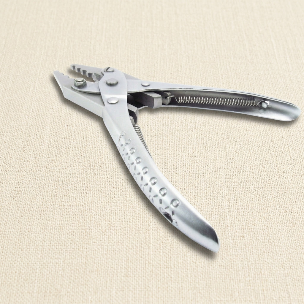 Parallel action swaging pliers with four holes, for woodwind repair and jewellery crafts.