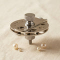 Steel pearl drilling vise with 13 cavities, 2-10mm, for jewellery making.