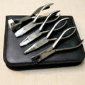 Set of five 5.5-inch stainless steel optical curving pliers for jewellery making, with case.