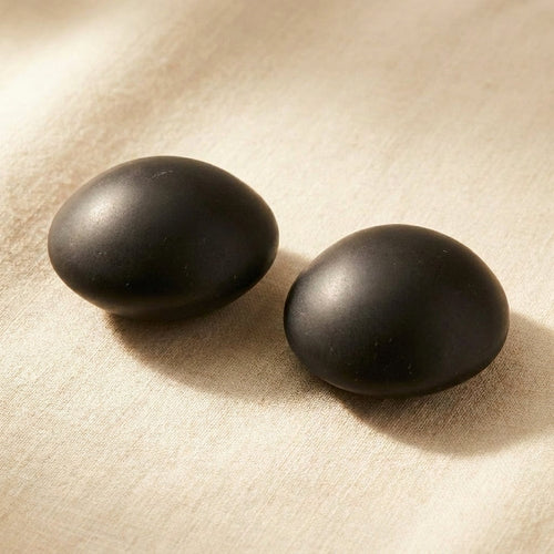 Dark round natural test stone for silver and gold jewellery scratch testing