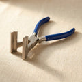 Professional parallel-action pliers for cutting wire and forming jump rings, stainless steel construction