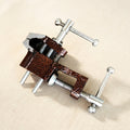 Mini cast iron bench clamp with 1-inch jaws for jewellery making and silversmithing.