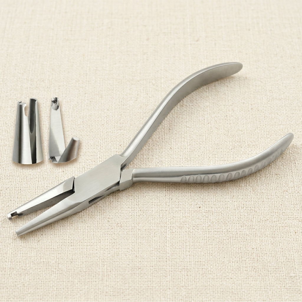 Professional optical pliers for adjusting nose pad arms on silver metal spectacle frames.