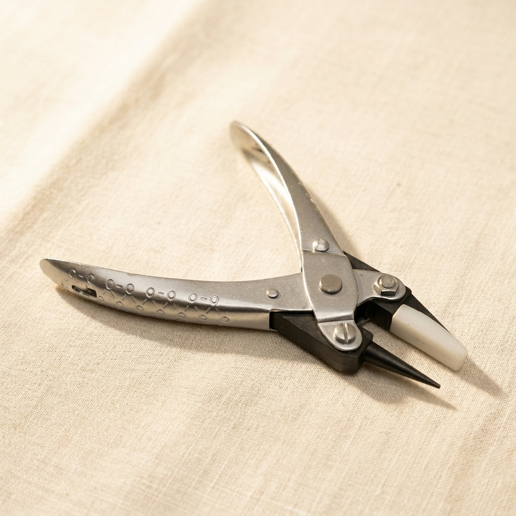 Professional parallel action jewellery pliers with silver metal body and nylon jaws