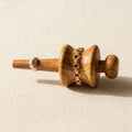 Professional jewellery polishing gizmo with wooden handle for detailed finishing and repairs
