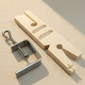 Jewellery bench pin with saw vice and clamp, featuring a V slot and parallel-action jaws for ring cutting.