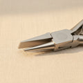 Stainless steel round and flat nose pliers with slim, ergonomic two-toned grips for jewellery making.