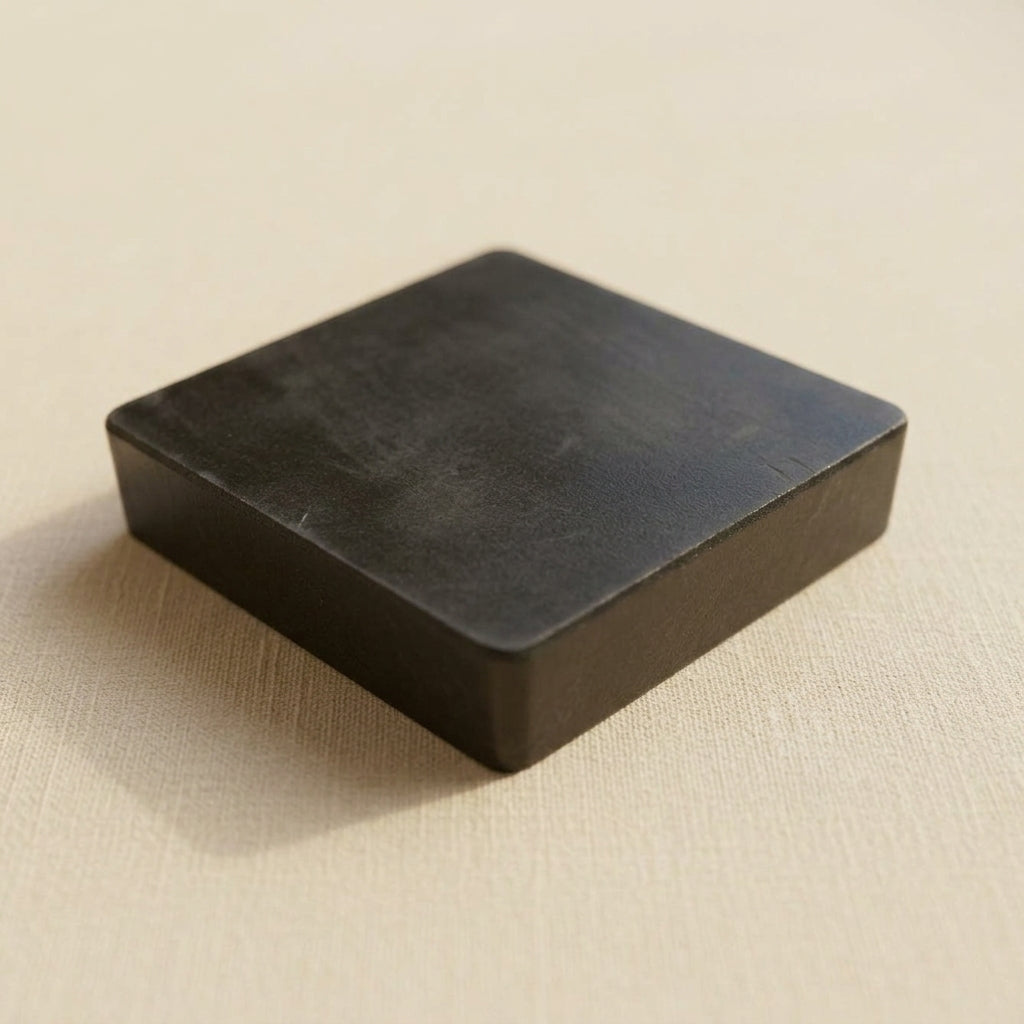 Rubber jewellery making block, 10cm square, for dapping and forming metal.