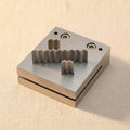 Steel disc cutter with three zigzag shaped punches for silversmithing blanks