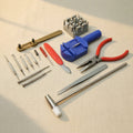 16-piece watch repair set including pin remover and strap adjuster, steel and plastic construction