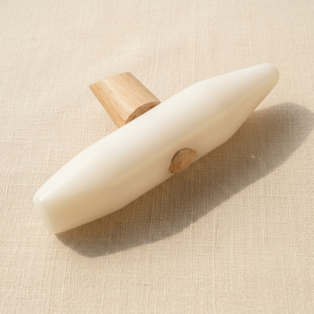 Wedge and cone Teflon mallet hammer for jewellery forming and shaping.