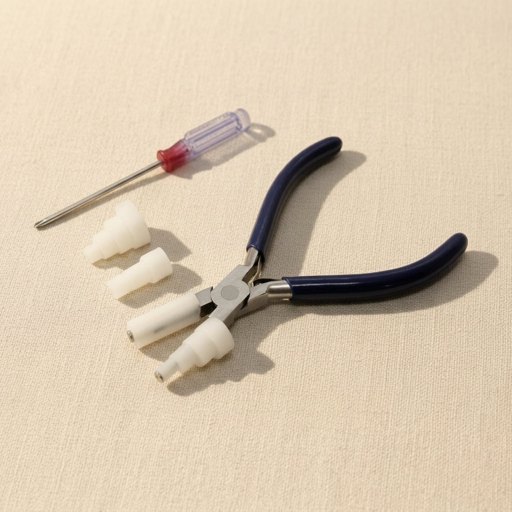 Wire wrapping pliers with interchangeable nylon jaws for jewellery making, featuring parallel action and a stainless-steel finish.